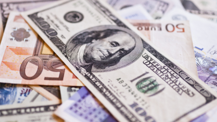 Dollar steadier after US data boost; stock market rally cools