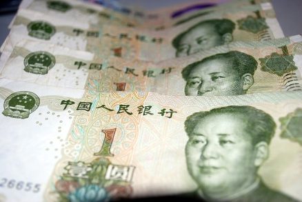 Yuan inches up as China scraps foreign investment limit in stock markets